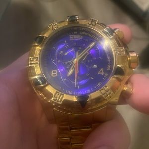 Temeite chronograph tachymeter water resistant NO 020 3bar large face gold watch